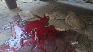 لقمة مغمسة بالدم بمخيم جباليا قبل قليل شمال القطاع (صورة)