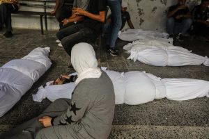 0c04211674ac00069cad1ae0eafc2b31 الصحة والهلال الاحمر الفلسطيني تنتشل جثامين تسعه شهداء شرقي رفح