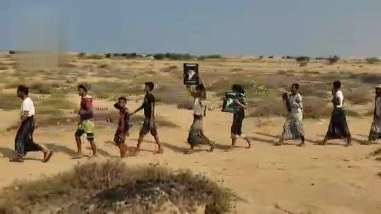 عرض ومسير لقوات التعبئة في حجة بيوم القدس العالمي